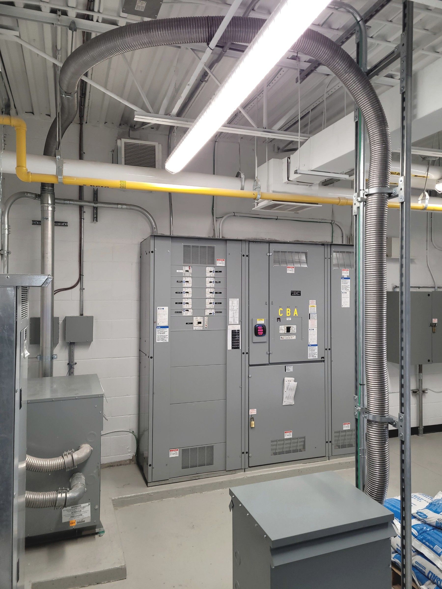 Commercial electrical room with distribution panels
